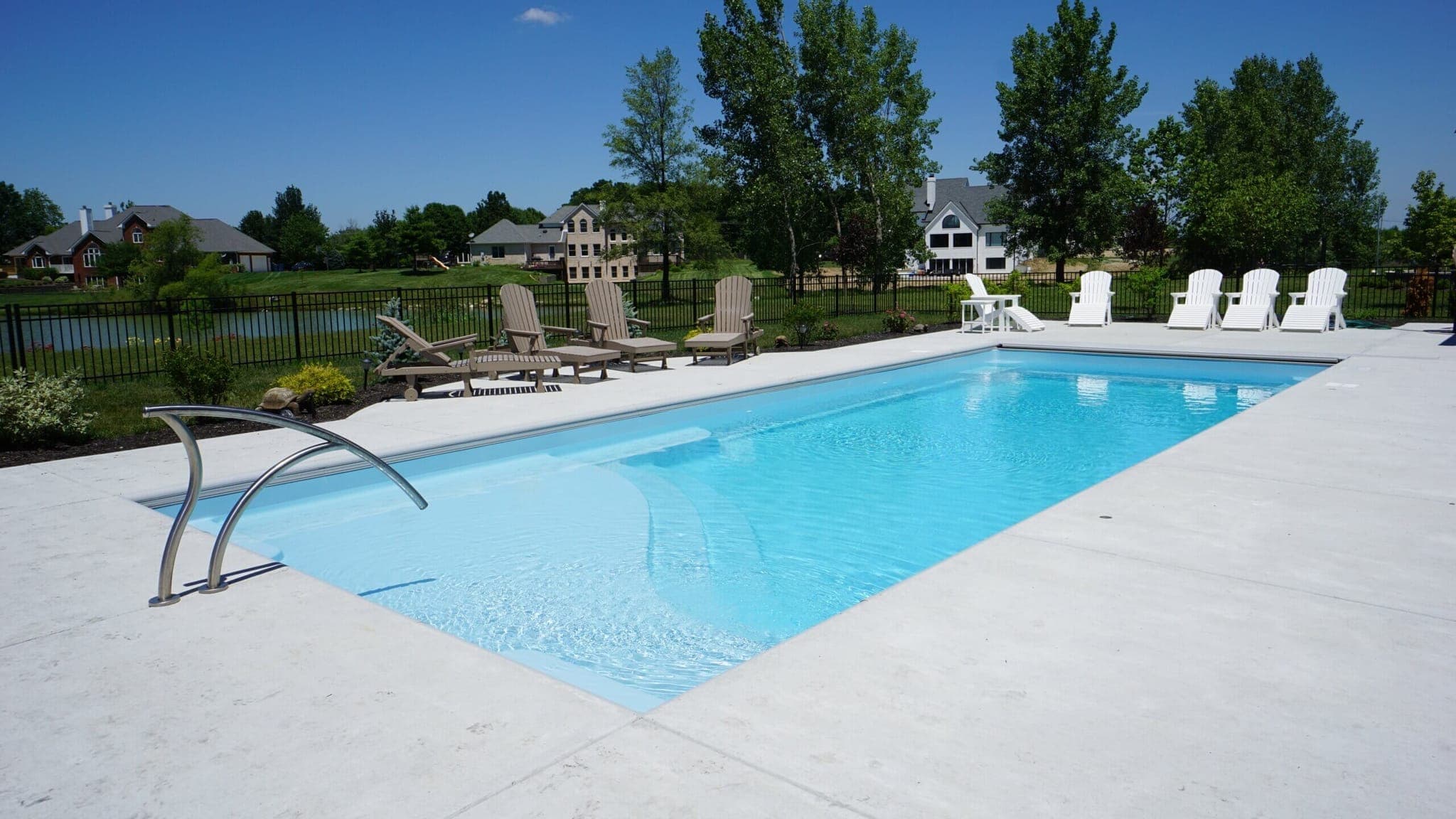 Aspen fiberglass pool with built-in tanning ledge